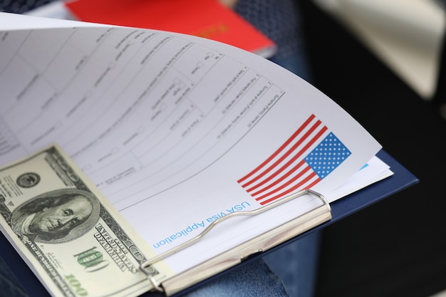 A close-up of a U.S. tax form highlighting the Child Tax Credit section, with a pen resting on the document, emphasizing the importance of claiming the credit.