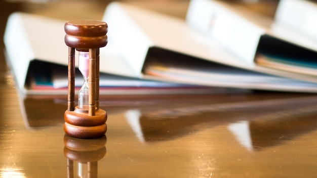A close-up image of a gavel resting on a stack of tax documents, symbolizing legislative action and financial decisions.