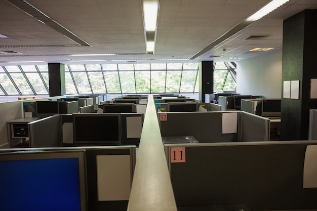 A split image showing two classrooms side-by-side: one with outdated equipment and overcrowded conditions, and the other with modern technology and ample space.