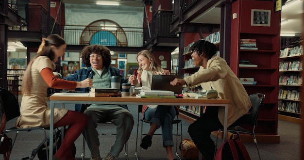 A diverse group of students working collaboratively on a project in a modern university library. The scene emphasizes teamwork, research, and intellectual discussion.